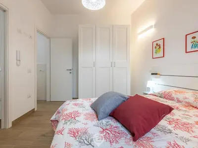 Letto o letti in una camera di Casa Aura
