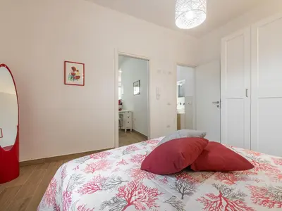 Letto o letti in una camera di Casa Aura