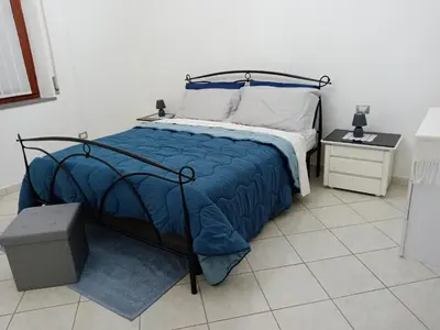 Letto o letti in una camera di Fontana Nuova