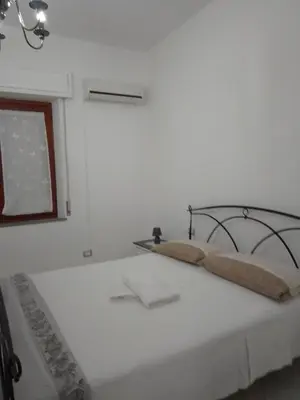 Letto o letti in una camera di Fontana Nuova