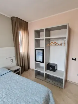Letto o letti in una camera di Le Anfore di Nora Domo