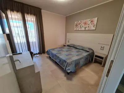 Letto o letti in una camera di Il Risveglio di Pula Domo