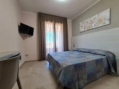 Letto o letti in una camera di Il Risveglio di Pula Domo