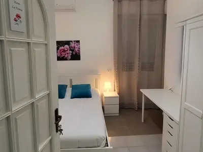 Letto o letti in una camera di Central Rooms Best Vacation Ever