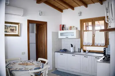 Cucina o angolo cottura di Elegante appartamento in centro Pula - vicino alle spiaggie