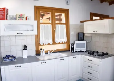 Cucina o angolo cottura di Elegante appartamento in centro Pula - vicino alle spiaggie