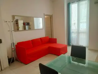 Area soggiorno di Appartamento di fronte al porto turistico