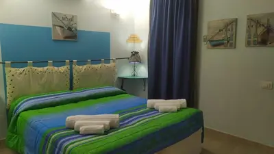 Letto o letti in una camera di La Pirata Capitana