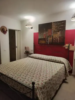 Letto o letti in una camera di La Pirata Capitana