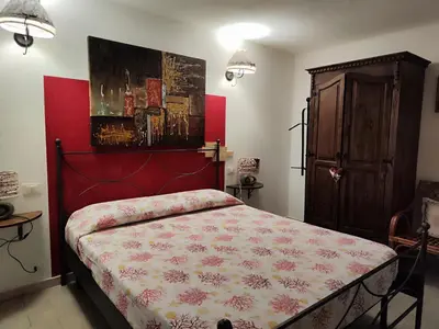 Letto o letti in una camera di La Pirata Capitana