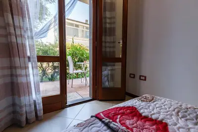 Letto o letti in una camera di Casa Lilla 1 e 2 casa indipendente con giardino