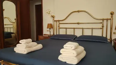 Letto o letti in una camera di Villa Teresa