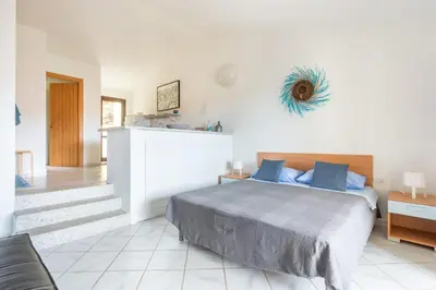 Letto o letti in una camera di IL NIDO