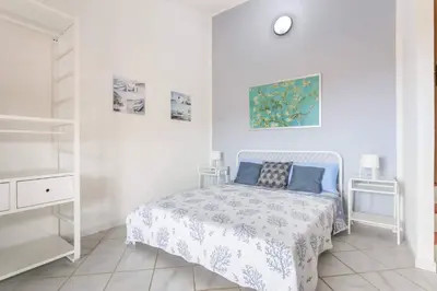 Letto o letti in una camera di RAINBOW