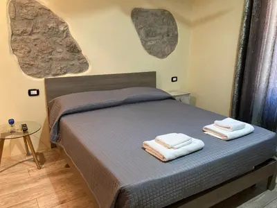 Letto o letti in una camera di Tra storia e realtà