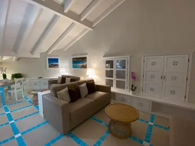 Area soggiorno di Suite Aquamarina con Jacuzzi Riservata & SPA