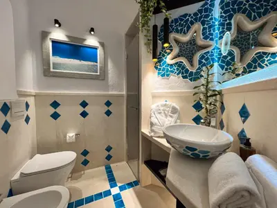 Bagno di Suite Villa Corallo & SPA