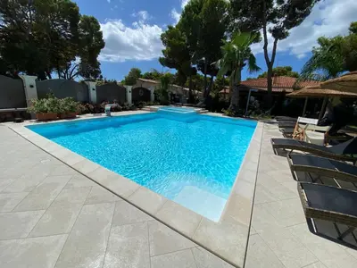 Piscina di Suite Villa Domos & SPA o nelle vicinanze