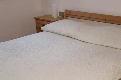 Letto o letti in una camera di Villa Luigina e Orazio,Cardedu, 7 posti letto