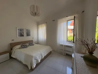 Letto o letti in una camera di La Casetta - Appartamento nei pressi del mare