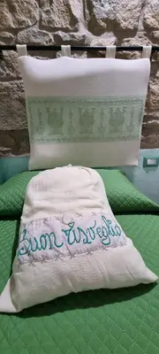 Letto o letti in una camera di B&B Martina