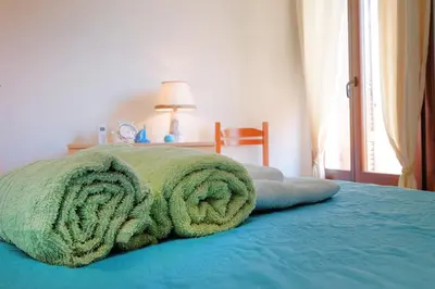 Letto o letti in una camera di Casa 
