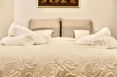 Letto o letti in una camera di Home Viale Trento 16