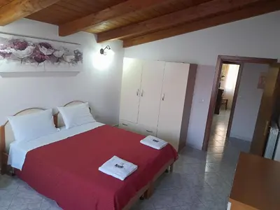Letto o letti in una camera di B&B da Marianna
