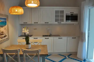Cucina o angolo cottura di Aquamarina Pintadera Rossa & SPA