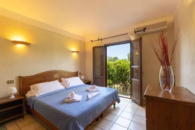 Letto o letti in una camera di Residence Baia delle Palme