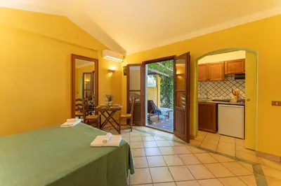 Cucina o angolo cottura di Residence Baia delle Palme