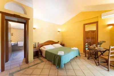 Letto o letti in una camera di Residence Baia delle Palme