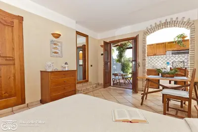 Letto o letti in una camera di Residence Baia delle Palme