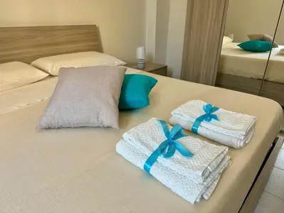Letto o letti in una camera di Il Quarzo Azzurro