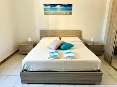 Letto o letti in una camera di Il Quarzo Azzurro