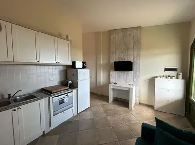 Cucina o angolo cottura di La Casetta di Lia - vista mare Eden Rock