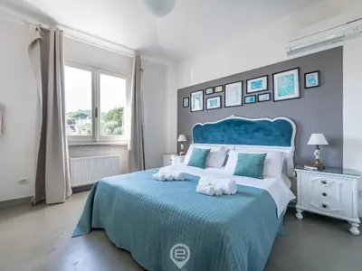 Letto o letti in una camera di Villa Virago