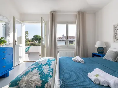 Letto o letti in una camera di Villa Virago