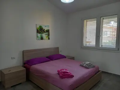 Letto o letti in una camera di Casa Beranu