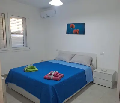 Letto o letti in una camera di Casa Istadi