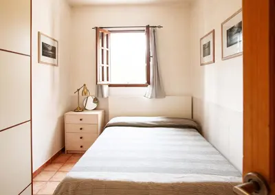 Letto o letti in una camera di Chia Soul Home