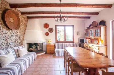 Area soggiorno di Chia Soul Home