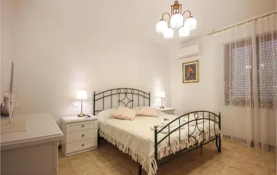 Letto o letti in una camera di Gorgeous Apartment In Quartu Sant'elena