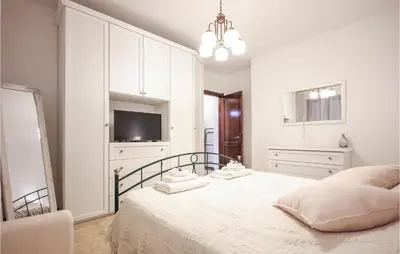 Letto o letti in una camera di Gorgeous Apartment In Quartu Sant'elena