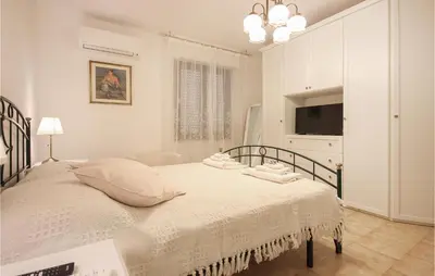 Letto o letti in una camera di Gorgeous Apartment In Quartu Sant'elena