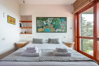 Letto o letti in una camera di Pedra - Seaside & pool villa in wild Mediterranean