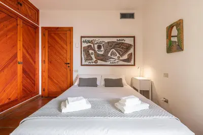 Letto o letti in una camera di Pedra - Seaside & pool villa in wild Mediterranean