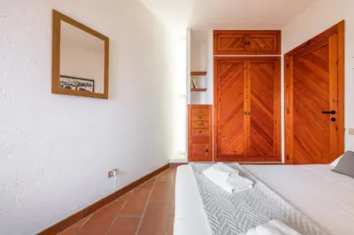 Letto o letti in una camera di Pedra - Seaside & pool villa in wild Mediterranean