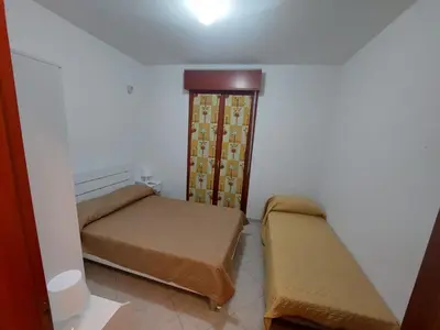 Letto o letti in una camera di Domus Dejanas Selargius
