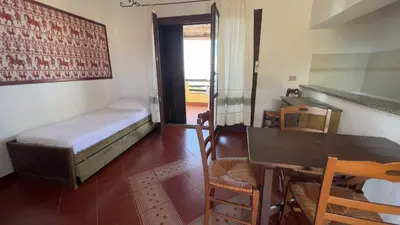Letto o letti in una camera di Torre delle Stelle Residence Aura Club